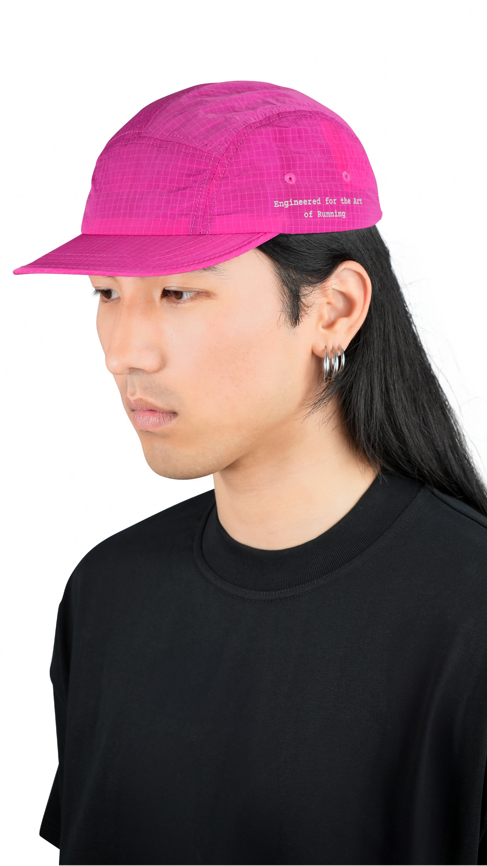 Lievre Running pink performance running cap, lightweight technical fabric with adjustable back cord and “Engineered for the Art of Running” text on the side panel.