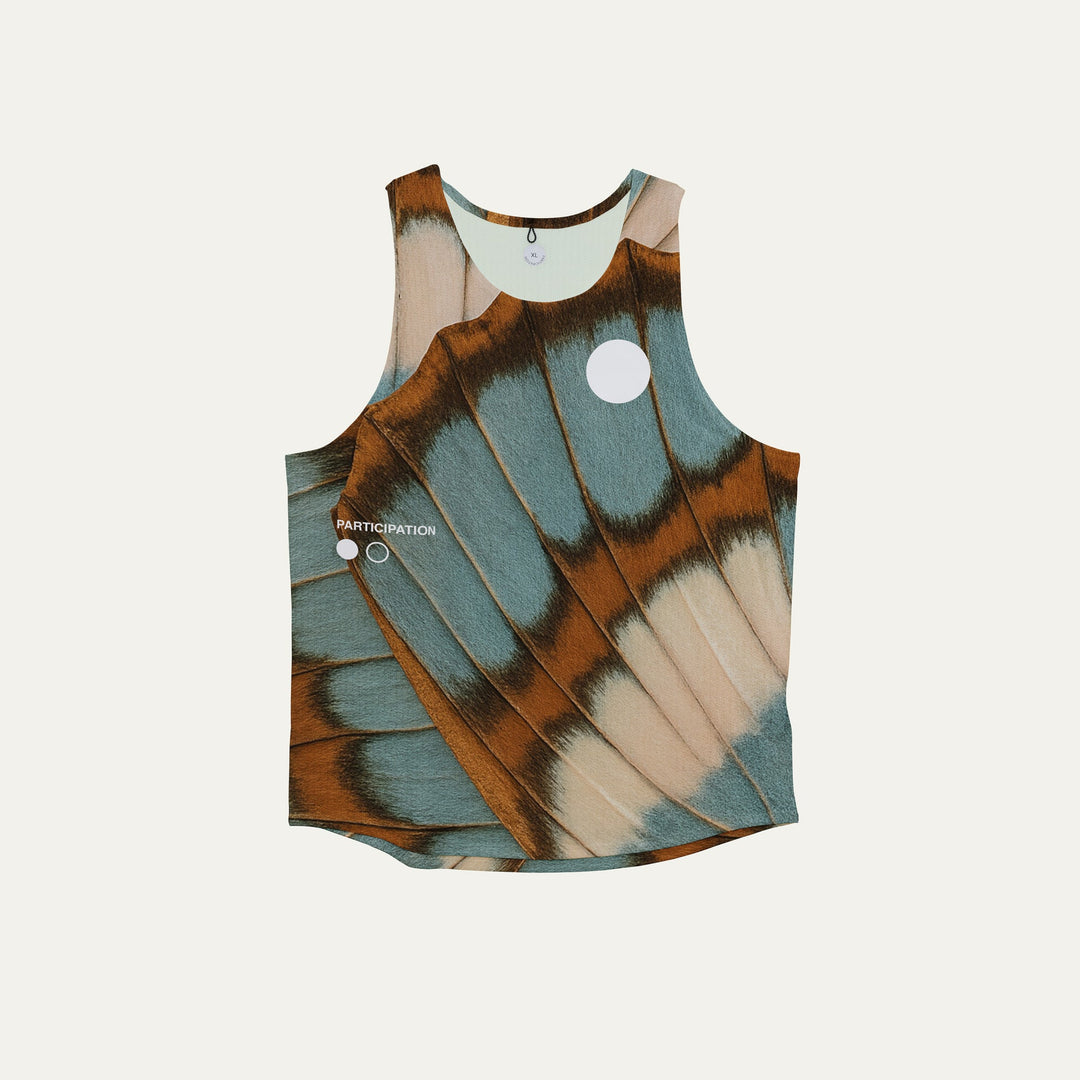 Participation butterfly singlet, breathable mesh, teal–tan wing print, white circle logo on chest.