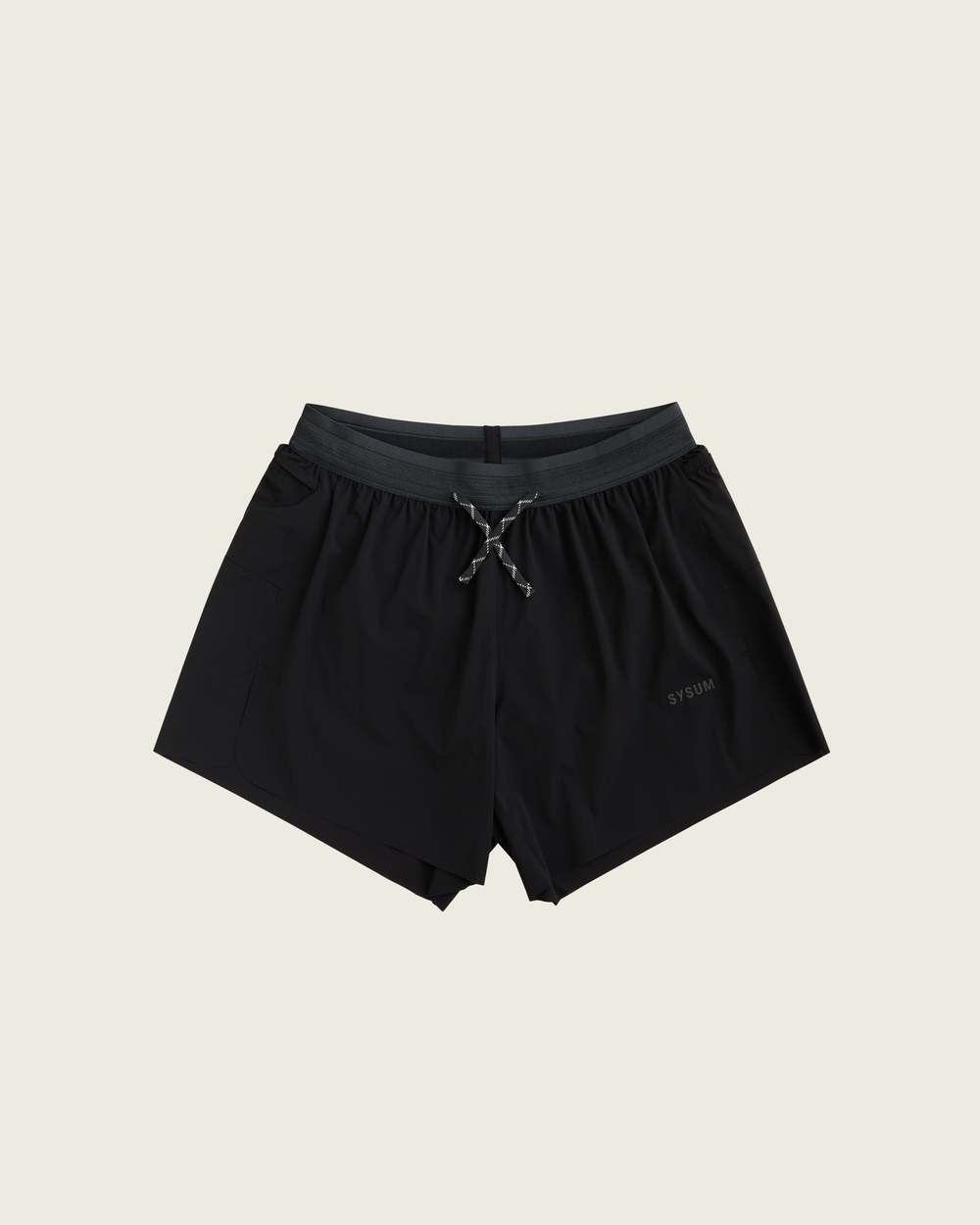 Men’s 4-inch Cordura® trail running shorts in Black from Sysum, ultra-light stretch fabric and pocket system visible, photographed in a neutral studio setting.