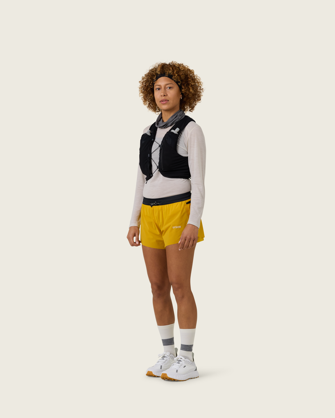Women’s 3-inch Cordura® trail running shorts in Sap from Sysum, ultra-light stretch fabric and pocket system visible, photographed in a neutral studio setting.